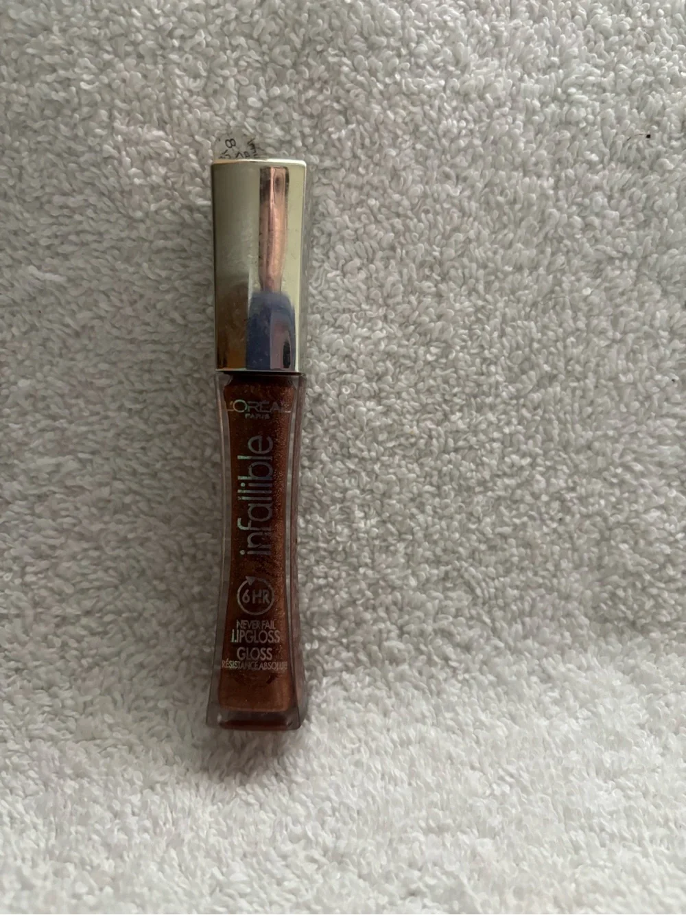 New L’Oréal infallible lipgloss shade 825 mirror underneath